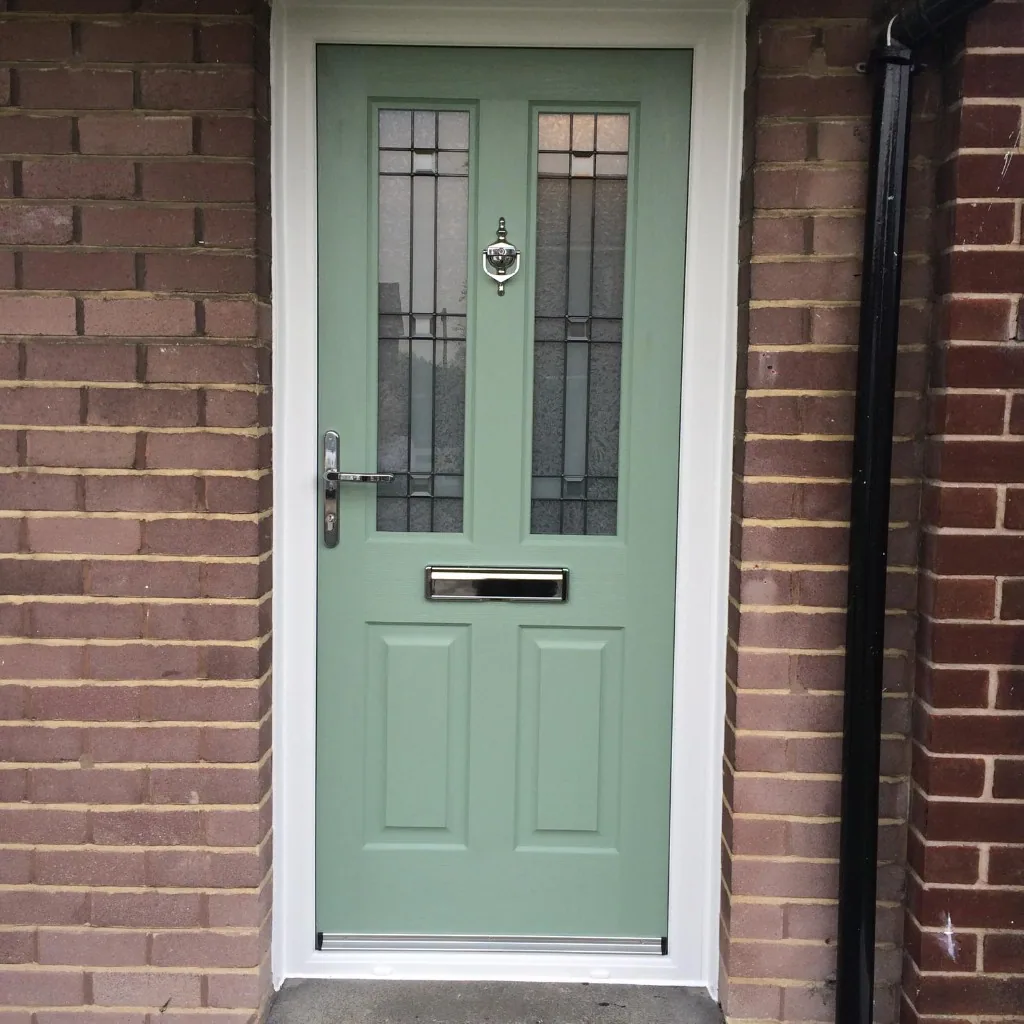 Sage green composite front door with decorative glass