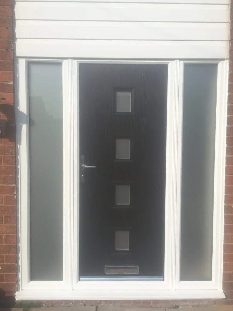 Black composite front door with frosted sidelights