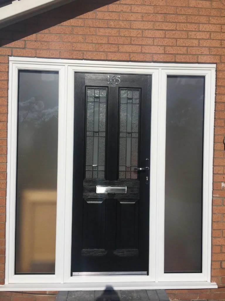Black composite front door with frosted sidelights