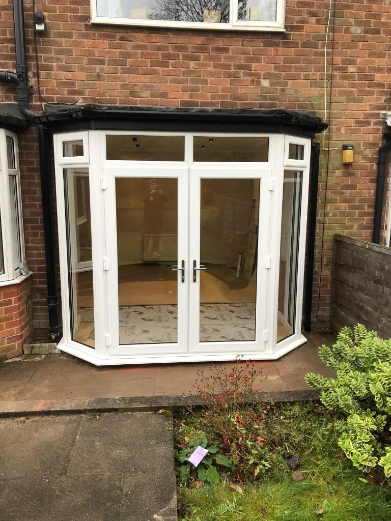 White uPVC French doors in bay configuration